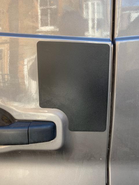 Renault Trafic rear door latch shield